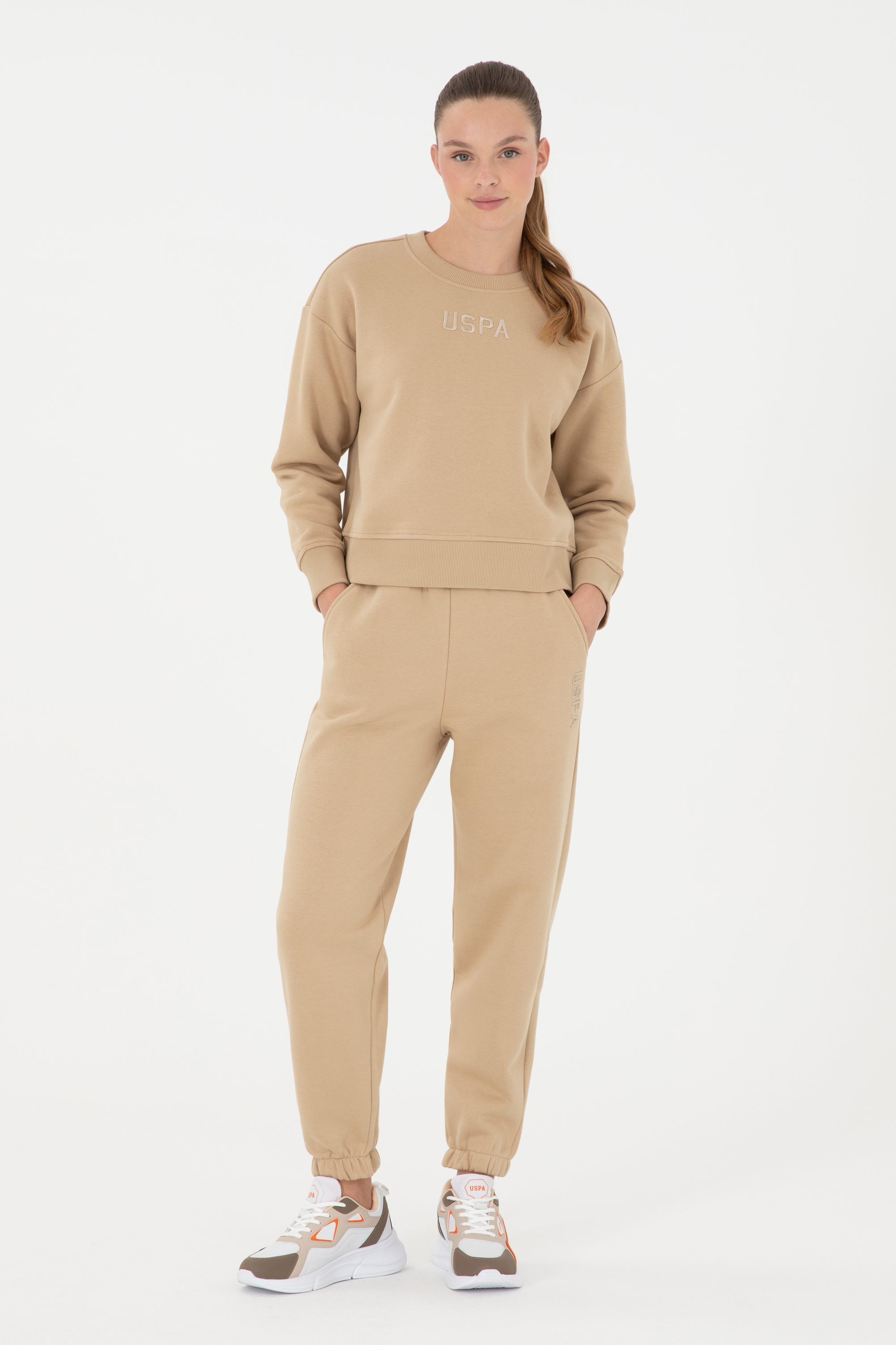 شلوار ورزشی کرمی جاگر زنانه یو اس پولو | US POLO ASSN