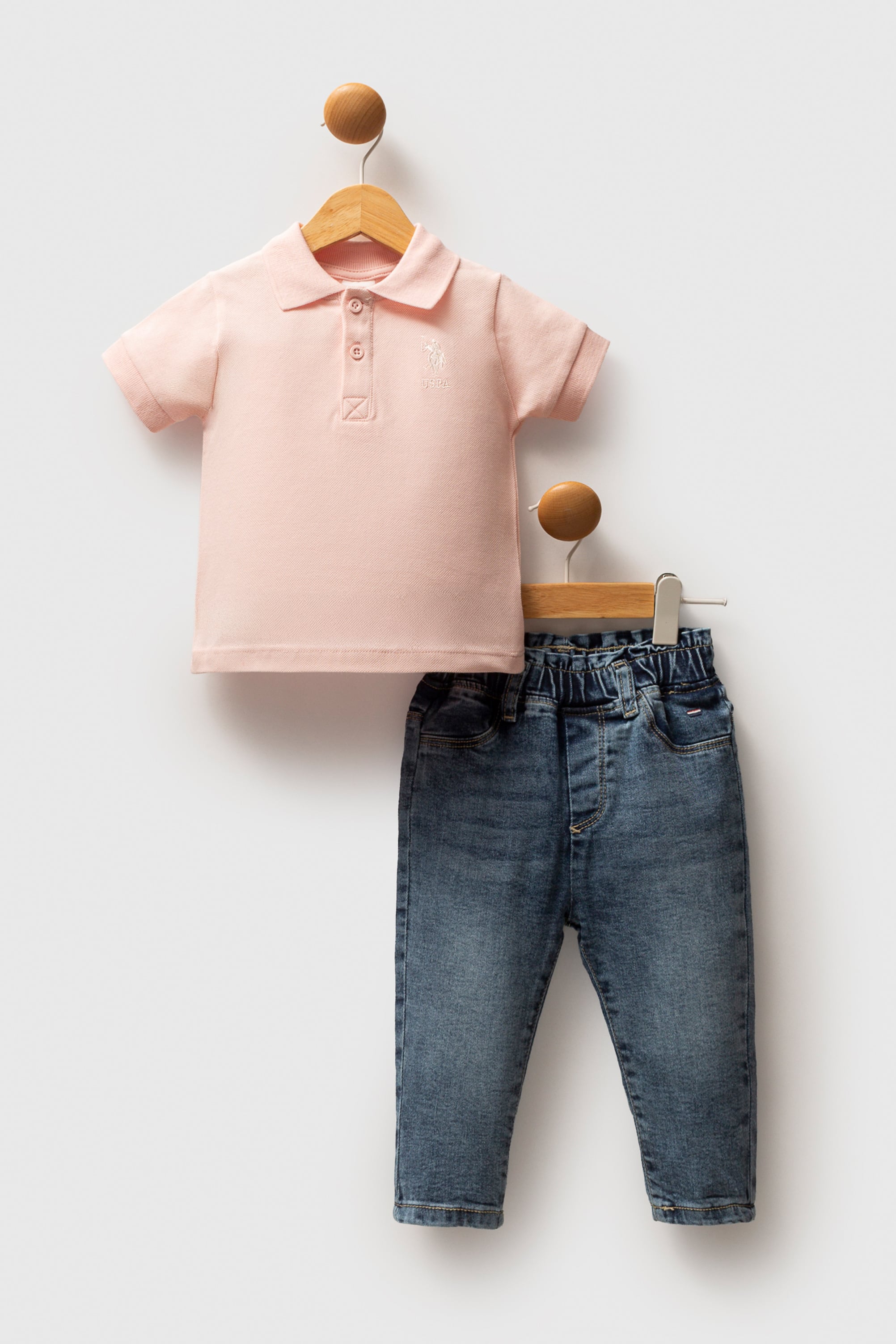 ست پولوشرت و شلوار گل بهی استاندارد فیت نوزاد دختر یو اس پولو | US POLO ASSN