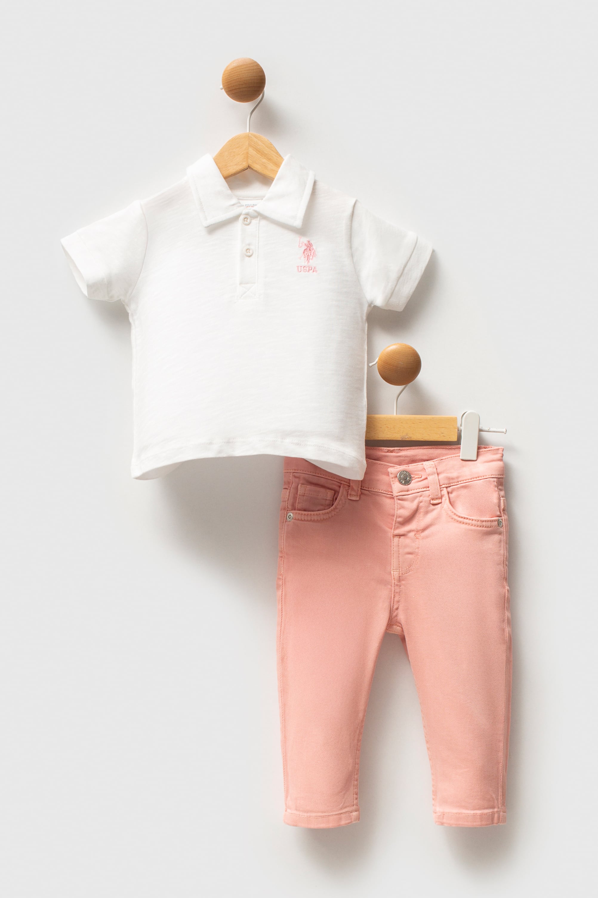 ست پولوشرت و شلوار سفید استاندارد فیت نوزاد دختر یو اس پولو | US POLO ASSN