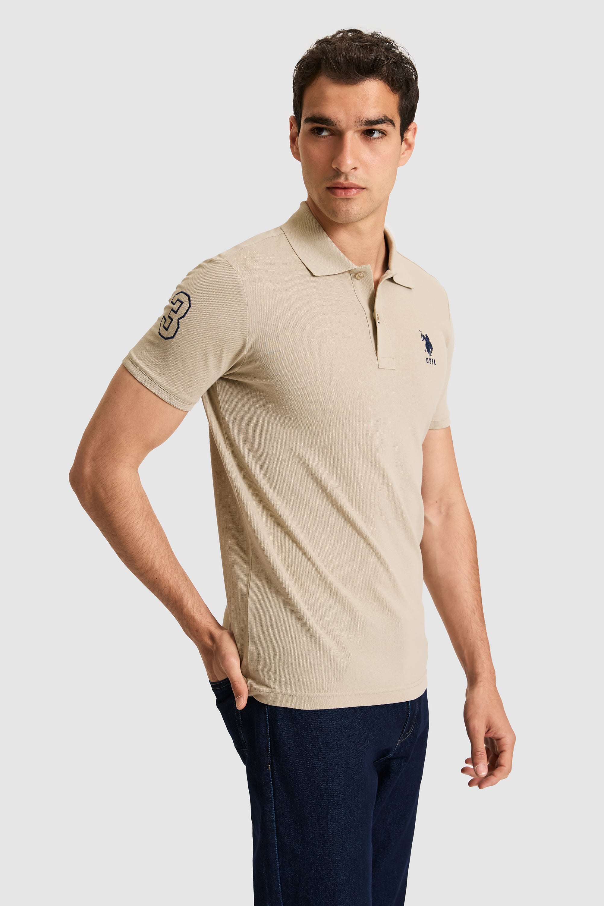 پولوشرت خاکی روشن اندامی مردانه یو اس پولو | US POLO ASSN